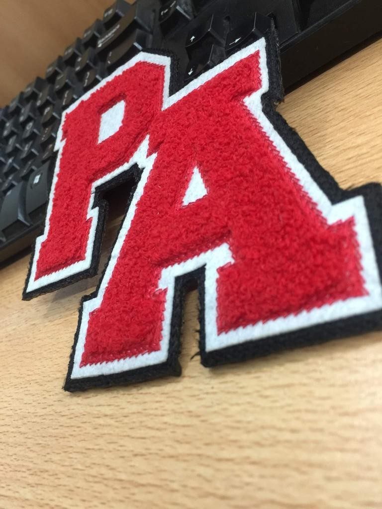 Close-up detail of a finished chenille letter patch
